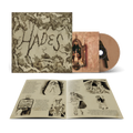 Imagen del CD de Melanie Martinez HADES con libro de historias, en la portada se muestra arte del álbum y el disco en primer plano.