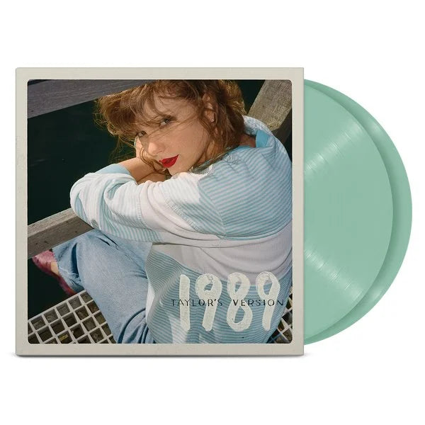 Vinilo de Taylor Swift 1989 (Taylor’s Version) en color aguamarina, de la marca Oh My Cd!, usado y en buen estado.