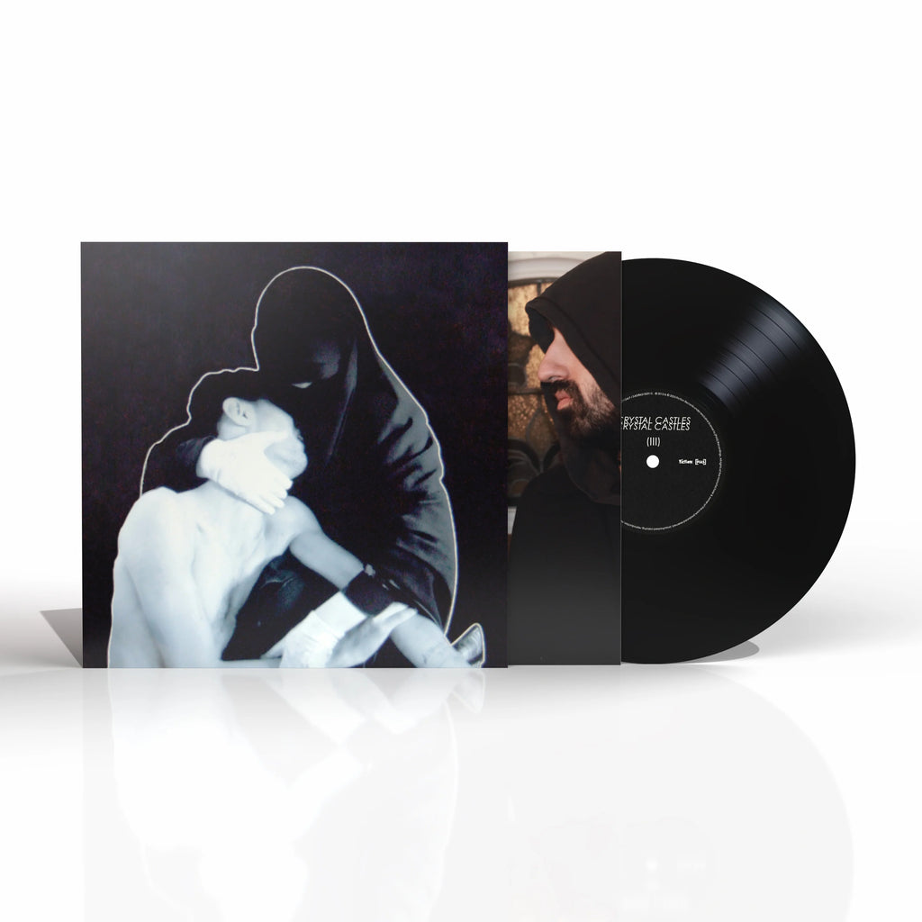 Portada del vinilo Crystal Castles III de la banda Crystal Castles, con diseño artístico y colores vibrantes.