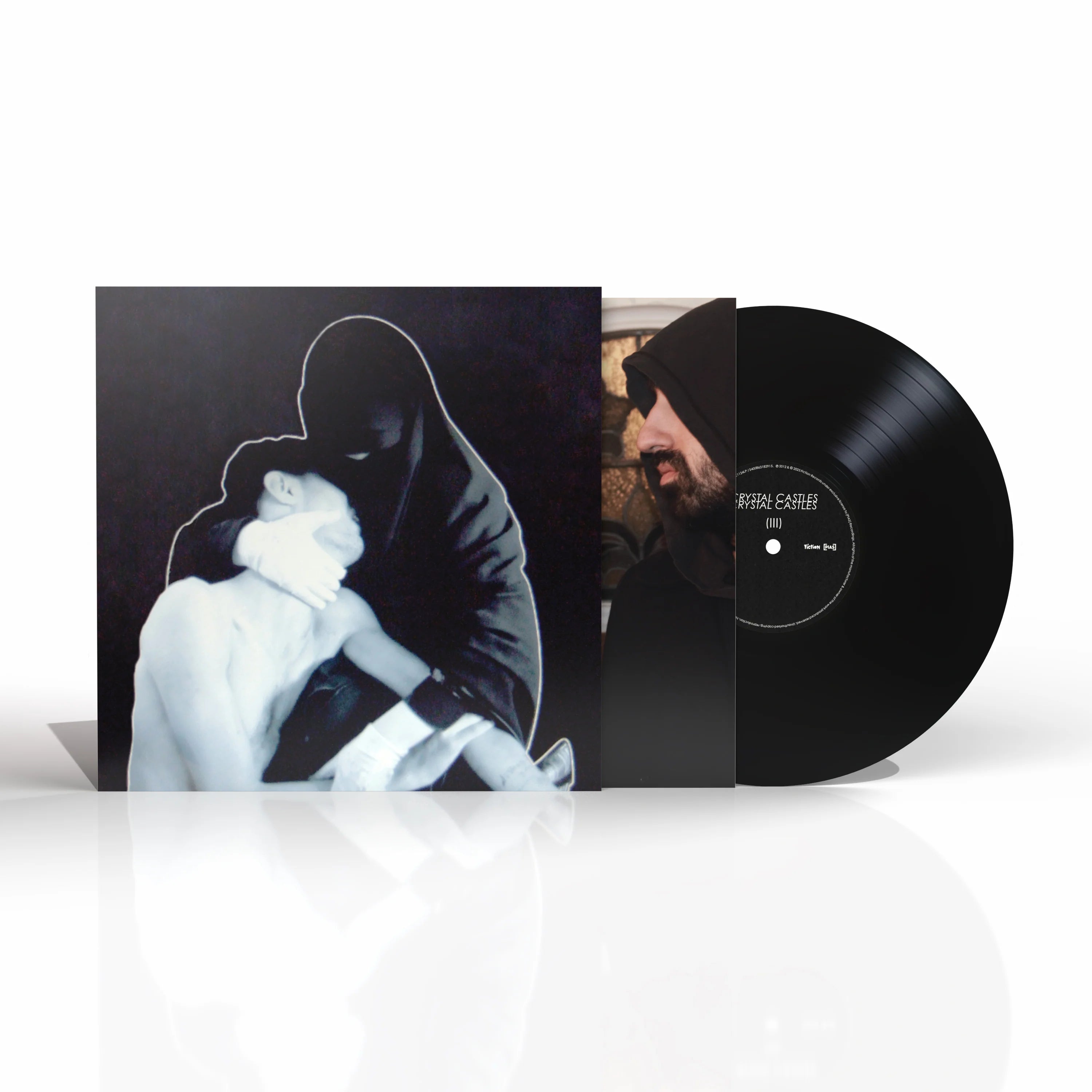 Portada del vinilo Crystal Castles III de la banda Crystal Castles, con diseño artístico y colores vibrantes.