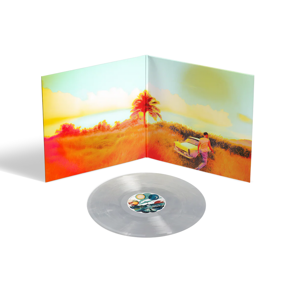 Vinilo de Louis Tomlinson "How Did I Get Here?" en colores blanco y mármol transparente, edición exclusiva de Oh My Cd.