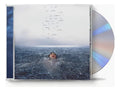CD de Shawn Mendes – Wonder con portada colorida y arte del álbum, en una funda de cartón con letras y diseño artístico.