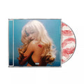 Portada del CD "Short n' Sweet" de Sabrina Carpenter en la edición Deluxe, en color azul brillante, con arte del álbum y título.