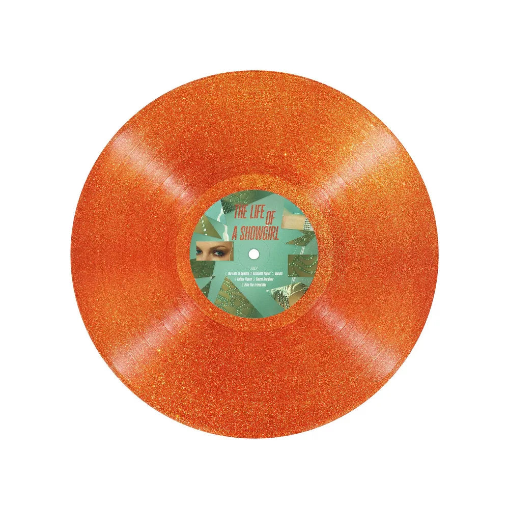 Perfume Taylor Swift The Life of a Showgirl de Oh My Cd! en frascos de vinilo con glitter naranja y notas de vainilla y naranja Portofino.