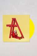 Vinilo amarillo exclusivo de Urban Outfitters de Billie Eilish – dont smile at me, usado, con portada y etiqueta visible.