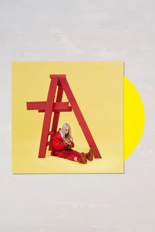 Vinilo amarillo exclusivo de Urban Outfitters de Billie Eilish – dont smile at me, usado, con portada y etiqueta visible.