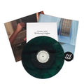 Vinilo doble de Charli XCX - Wuthering Heights en vinilo verde y negro, con ilustración artística en portada.