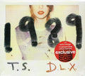 CD de la edición deluxe de Taylor Swift 1989 con fotos Polaroid, en funda con arte de la portada.