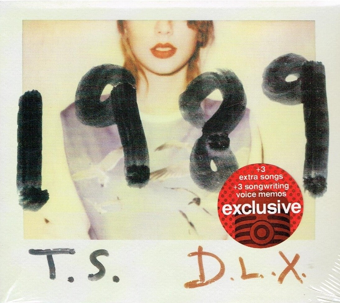 CD de la edición deluxe de Taylor Swift 1989 con fotos Polaroid, en funda con arte de la portada.
